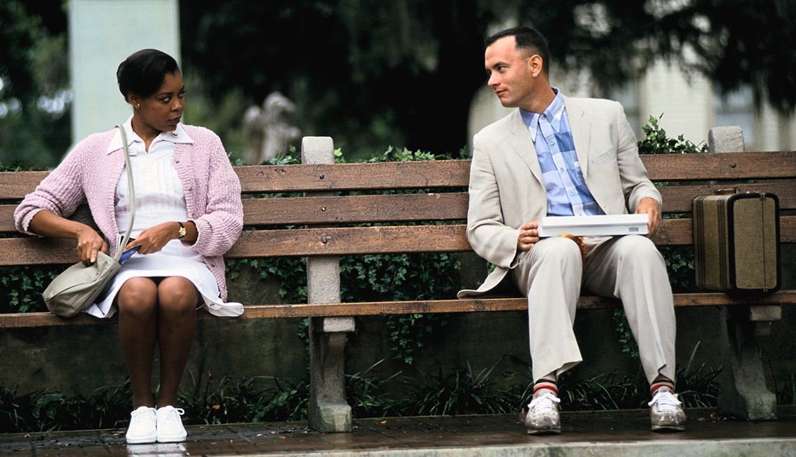 Forrest Gump and woman seated on a bench in the film
